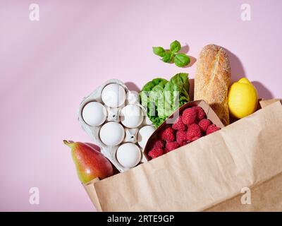 Paper shopping bag with organic groceries Stock Photo