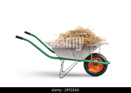 Studio shot of a metal wheelbarrow with hay isolated on white background Stock Photo