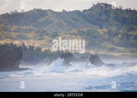 Scenic view of large surf, ocean waves crashing against the rocks at the beach in Bathsheba; Bathsheba, Barbados, Caribbean Stock Photo
