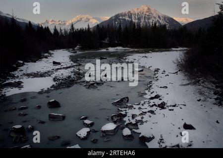 Mendenhall River surrounded by McGinnis Mountain and other peaks in Alaska, USA; Juneau, Alaska, United States of America Stock Photo