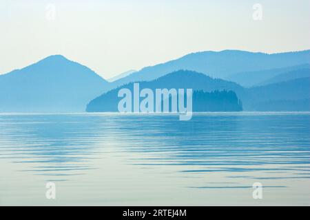 Silhouetted beauty of the Inside Passage, Alaska, USA at twilight; Petersburg, Mitkof Island, Alaska, United States of America Stock Photo