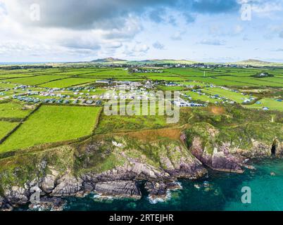Cliffs over Caerfai Beach and Bay from a drone, St Davids, Haverfordwest, Wales, England Stock Photo