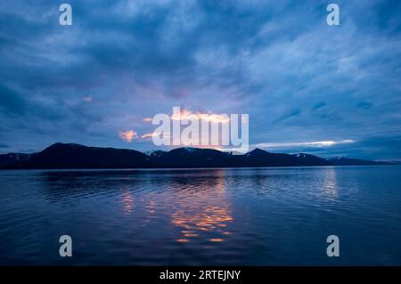 Sunset afterglow over Glacier Bay National Park and Preserve, Alaska, USA; Alaska, United States of America Stock Photo