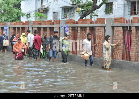 After continuous rain for 1 hour, water freezes in Jigatola & people's travel became very difficult. Dhaka, Bangladesh. 11th Sep, 2023. (Photo by Md. Saiful Amin/Pacific Press/Sipa USA) Credit: Sipa USA/Alamy Live News Stock Photo