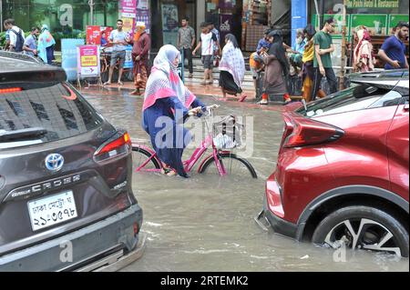 After continuous rain for 1 hour, water freezes in Jigatola & people's travel became very difficult. Dhaka, Bangladesh. 11th Sep, 2023. (Photo by Md. Saiful Amin/Pacific Press/Sipa USA) Credit: Sipa USA/Alamy Live News Stock Photo