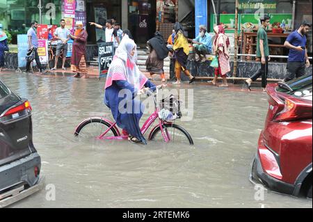 After continuous rain for 1 hour, water freezes in Jigatola & people's travel became very difficult. Dhaka, Bangladesh. 11th Sep, 2023. (Photo by Md. Saiful Amin/Pacific Press/Sipa USA) Credit: Sipa USA/Alamy Live News Stock Photo