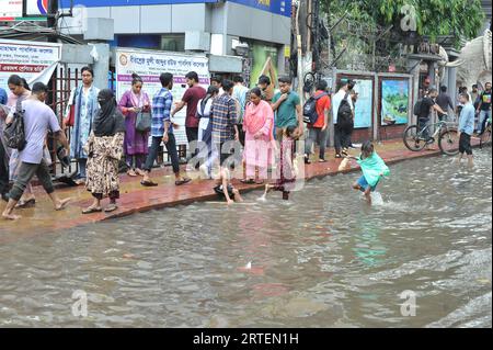 After continuous rain for 1 hour, water freezes in Jigatola & people's travel became very difficult. Dhaka, Bangladesh. 11th Sep, 2023. (Photo by Md. Saiful Amin/Pacific Press/Sipa USA) Credit: Sipa USA/Alamy Live News Stock Photo