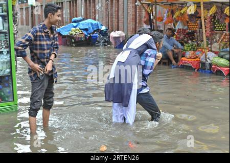 After continuous rain for 1 hour, water freezes in Jigatola & people's travel became very difficult. Dhaka, Bangladesh. 11th Sep, 2023. (Photo by Md. Saiful Amin/Pacific Press/Sipa USA) Credit: Sipa USA/Alamy Live News Stock Photo