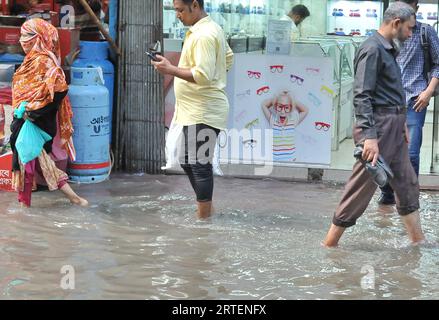 After continuous rain for 1 hour, water freezes in Jigatola & people's travel became very difficult. Dhaka, Bangladesh. 11th Sep, 2023. (Photo by Md. Saiful Amin/Pacific Press/Sipa USA) Credit: Sipa USA/Alamy Live News Stock Photo