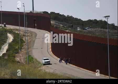 Tijuana, Baja California, Mexico. 12th Sep, 2023. Around a hundred people are stuck between the two US-Mexico border fences dividing Tijuana and San Diego on Tuesday, September 12, 2023, as viewed from Tijuana, Mexico. (Credit Image: © Carlos A. Moreno/ZUMA Press Wire) EDITORIAL USAGE ONLY! Not for Commercial USAGE! Stock Photo