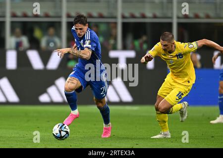 Nicolo Zaniolo Of Italy And Vitaliy Mykolenko Of Ukraine Battle For The ...