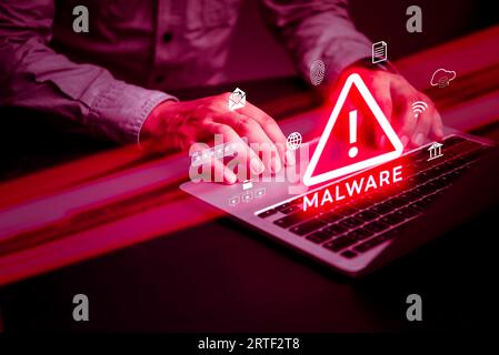 hacker uses malware with laptop computer hack password the personal data and money from Bank accounts.Scam Virus Spyware Malware Antivirus digital tec Stock Photo