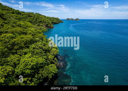 Beautiful aerial view of Playas del Coco, Hermosa Beach and its green mountains, bay and yachts in Costa Rica Stock Photo