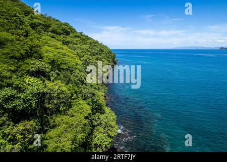 Beautiful aerial view of Playas del Coco, Hermosa Beach and its green mountains, bay and yachts in Costa Rica Stock Photo