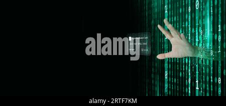 A hacker behind binary code, stream of data, able to break through cyber security and reaches his hand out to control your personal identity Stock Photo