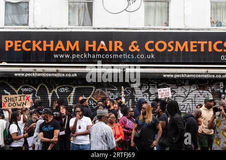 London, UK. 12th Sep, 2023. Protesters gather outside Peckham Hair and Cosmetics during the demonstration. Demonstrators gathered outside Peckham Hair and Cosmetics shop over a video circulating on social media. The video shows a scuffle between a woman and the male owner of Peckham Hair and Cosmetics, Sohail Sindho, 45, who appears to put his hands around her throat during the altercation. (Photo by Thabo Jaiyesimi/SOPA Images/Sipa USA) Credit: Sipa USA/Alamy Live News Stock Photo