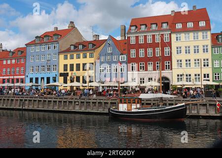 Summer view of Nyhavn pier with color buildings i ships,  in the Old Town of Copenhagen, Denmark Stock Photo