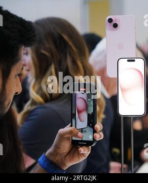 San Francisco, USA. 12th Sep, 2023. People try new Apple products after their launch in Cupertino, California, the United States, Sept. 12, 2023. Apple on Tuesday announced several new products in its iPhone series and Apple Watch series. Credit: Wu Xiaoling/Xinhua/Alamy Live News Stock Photo