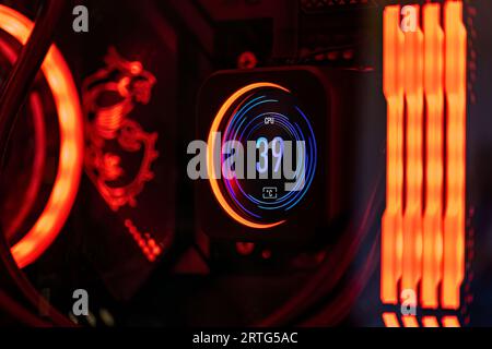 Milan, Italy 19 august 2023: A vivid view of a CPU's liquid cooling system inside a premium gaming computer. Stock Photo