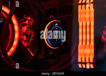 Milan, Italy 19 august 2023: A vivid view of a CPU's liquid cooling system inside a premium gaming computer. Stock Photo