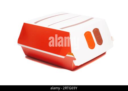 Closed paper burger box isolated on white. Stock Photo