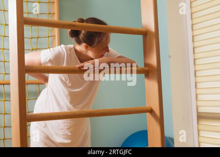 Pregnant woman trying to breath to soothe the pain of her labor contractions Stock Photo