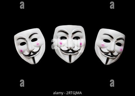 anonymous mask isolated on black background Stock Photo