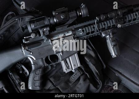 Colt M16 SPR Rifle chambered in .22lr small caliber with Vortex red dot and 3x magnifier. Stock Photo