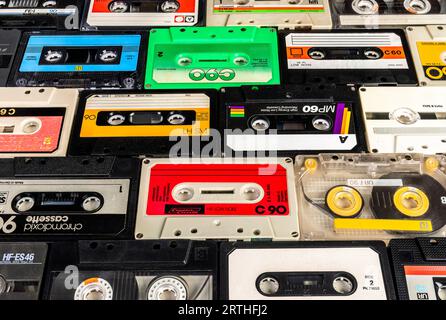 used vintage audio cassettes various types background Stock Photo