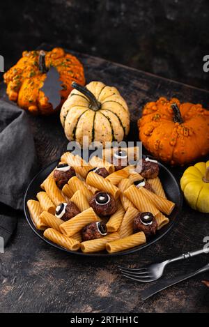 Halloween pasta with meatballs monster eye Stock Photo