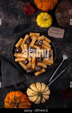 Halloween pasta with meatballs monster eye Stock Photo