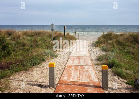 Boardwalk to the beach at Baltic Sea in Jastarnia, small resort town on Hel Peninsula in Poland Stock Photo