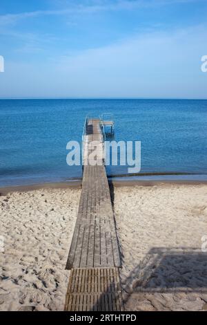 Beach and simple pier in Hel town on Hel Peninsula at Baltic Sea in Poland, Pomerania region Stock Photo