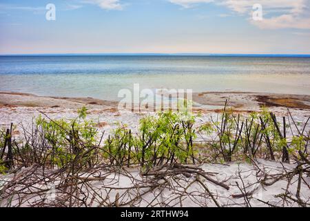 Sandy shore of a small beach in Jastarnia town on Hel Peninsula on the Baltic Sea in Poland Stock Photo