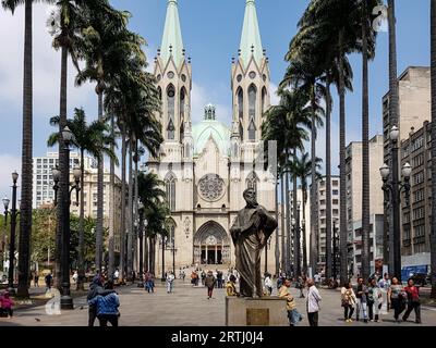 Majestic Metropolitan Cathedral of Sao Paulo at Cathedral Square in downtown, a statue in foreground Stock Photo