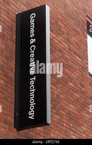 University for the Creative Arts (UCA) campus in Farnham, Surrey, England, UK. Sign for the Games & Creative Technology building. Stock Photo