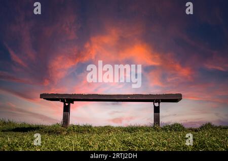 Amazing sunset sky over Bench in Auckland, New Zealand Stock Photo