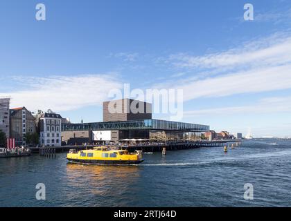 Copenhagen, Denmark, August 17, 2016: View of the the playhouse with the harbor ferry arriving Stock Photo