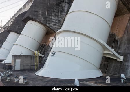 Foz do Iguazu, Brazil, july 10, 2016: View of the Itaipu dam giant penstocks. The Dam is located on river Parana on the border of Brazil and Paraguay Stock Photo