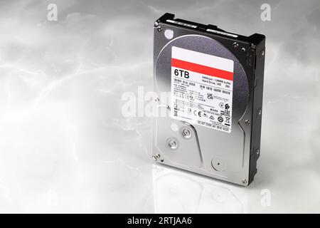 Close up view of high capacity computer hard drive 3.5' isolated on white background. Stock Photo