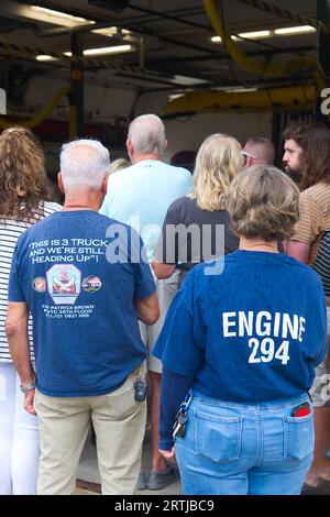 911 commemoration ceremony at Barnstable, MA Fire Headquarters on Cape Cod, USA. Shirts commemorating 911 at the event Stock Photo