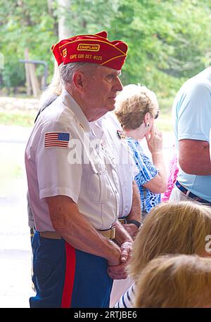 911 commemoration ceremony at Barnstable, MA Fire Headquarters on Cape Cod, USA. A veteran looks on. Stock Photo