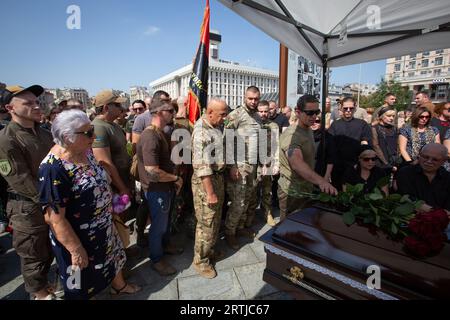 Kyiv, Ukraine. 28th Aug, 2023. Friends and brothers in arms pay their last respects during farewell ceremony of deceased Sergii Ilnitskiy. Sergii Ilnitskiy a deputy of Kyiv Council and Ukrainian Volunteer Army's South Unit Commander was killed in the Donetsk region in battles with the Russian army, in central Kyiv. (Credit Image: © Oleksii Chumachenko/SOPA Images via ZUMA Press Wire) EDITORIAL USAGE ONLY! Not for Commercial USAGE! Stock Photo