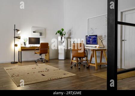 Interior of modern office with programmer's workplaces Stock Photo - Alamy