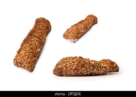 A loaf of bread with sunflower seeds isolated on a white background. Stock Photo