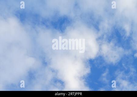 Blue sky and clouds. The sky with clouds. White clouds in the blue sky. Stock Photo