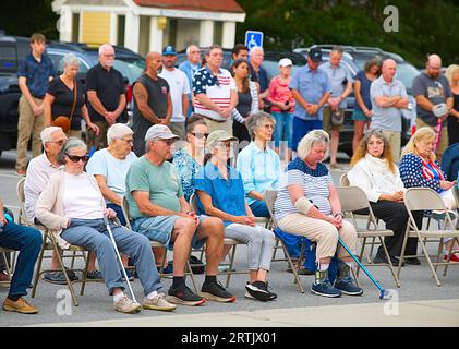 911 commemoration ceremony at Brewster, MA Fire Headquarters on Cape Cod, USA. Onlookers at the ceremony Stock Photo