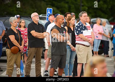 911 commemoration ceremony at Brewster, MA Fire Headquarters on Cape Cod, USA. Onlookers at the ceremony Stock Photo