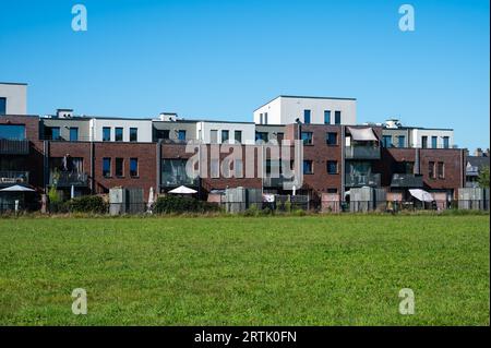 Essen, Antwerp Province, Belgium, September 9, 2023 - Contemporary apartment blocks with green surroundings Stock Photo