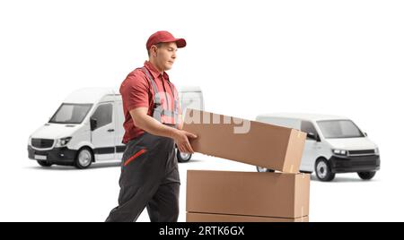Worker sorting boxes in front of a delivery van isolated on white background Stock Photo